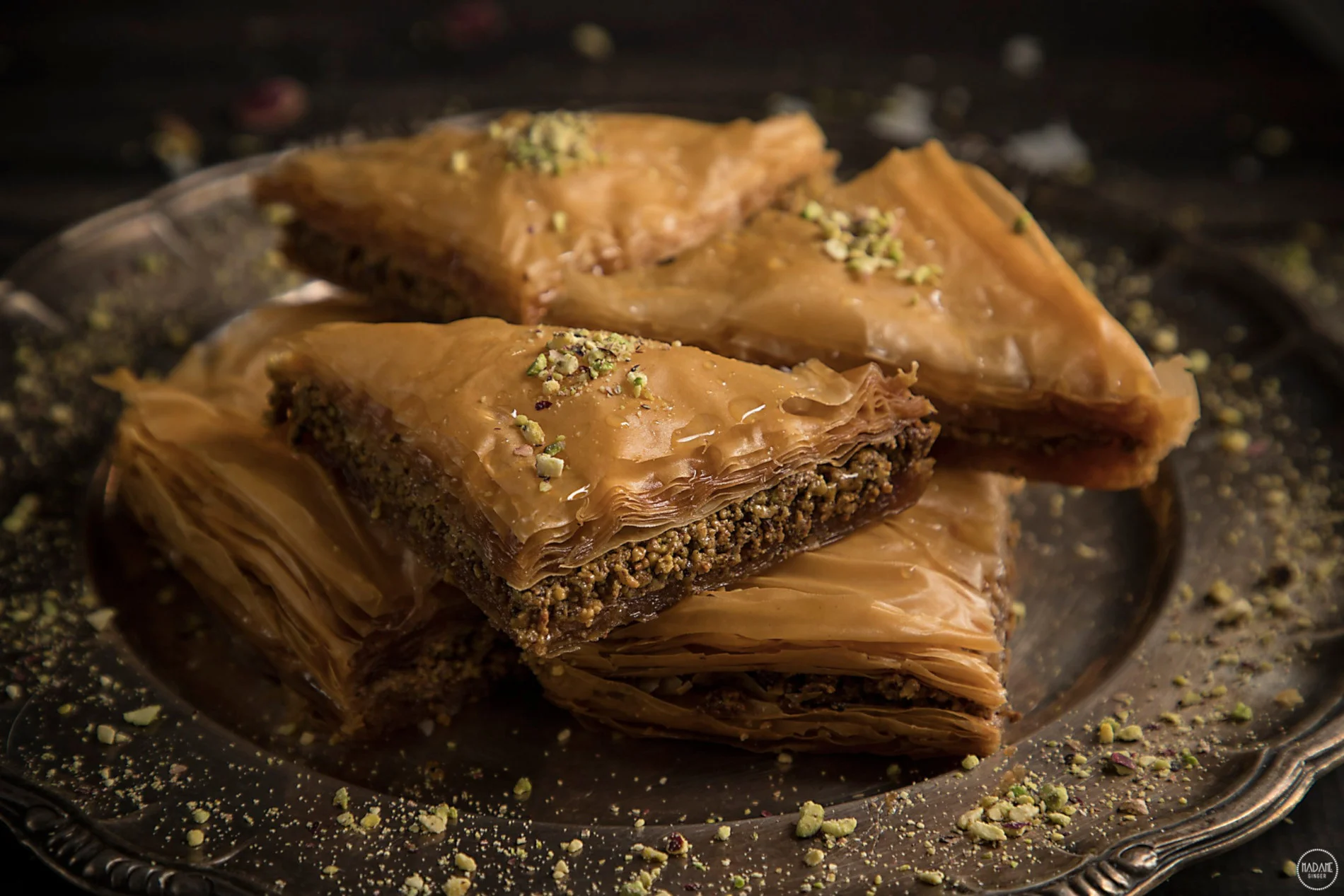 Nobody should leave Greece without tasting the mouth-watering phyllo-based baklava . Photo source: madameginger.com
