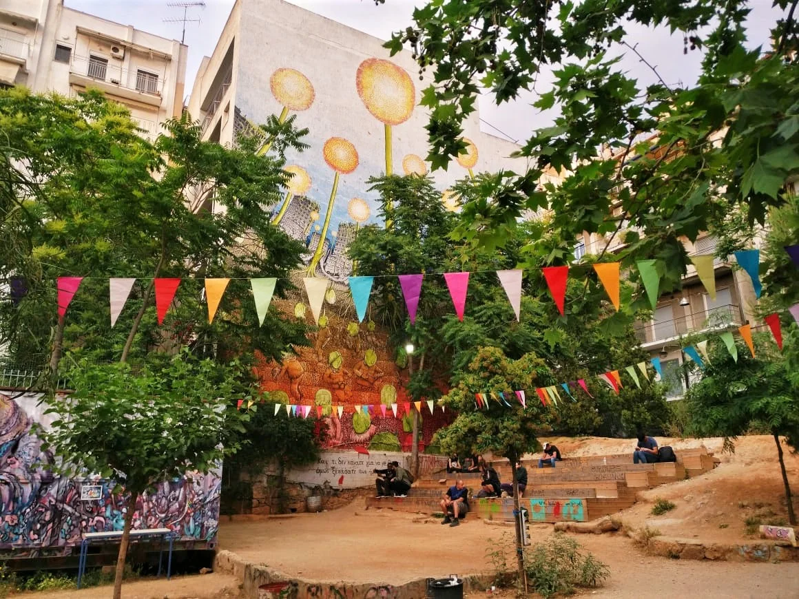 Watch the locals having a beer or a coffee, relaxing at their colorful park. Photo source: Truevoyagers
