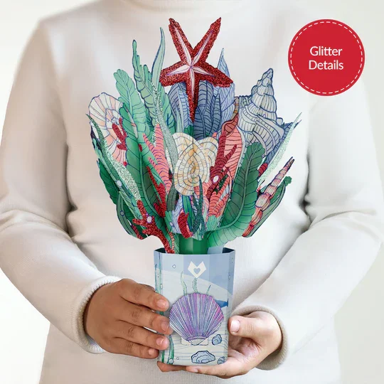 CP12672_CoralGlitterBouquet_Handmodel.webp