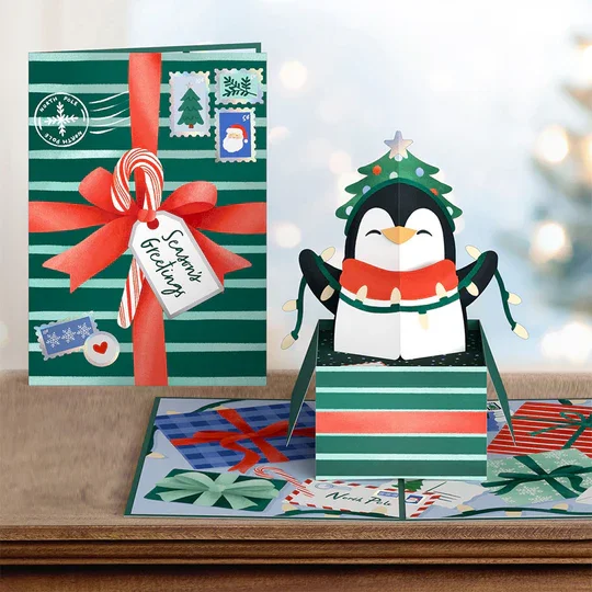 LP8501_Season_s_Greetings_Penguin_Surprise_Pop-Up_Card_Lifestyle_testing_5a6d8075-9b84-4c44-8a33-bee2e2e67e90.webp