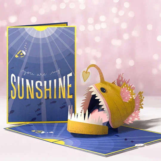 LP10011_You_Are_My_Sunshine_Anglerfish_Pop-Up_Card_CoverOverview_Lifetyle.webp
