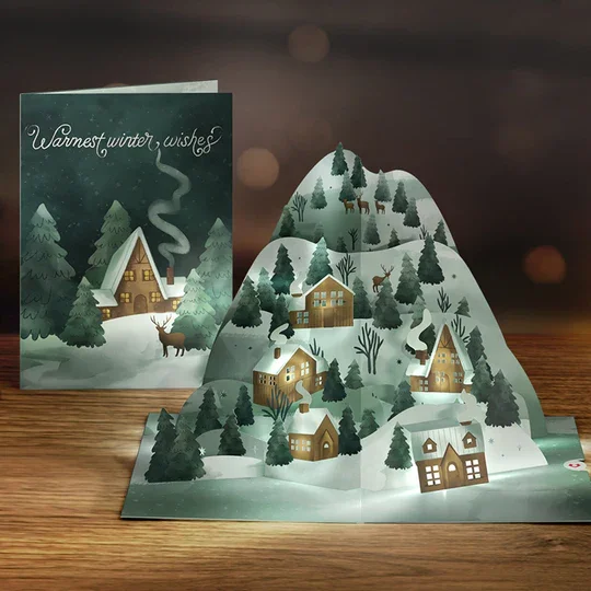 LP8518_WinterWishesMountainVillageLight-UpPop-UpCard_Lifestyle-1.webp