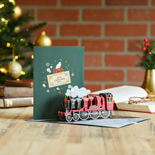 LP4169HarryPotterHolidayHogwarts_ExpressPop-UpCardLifestyle_1.webp
