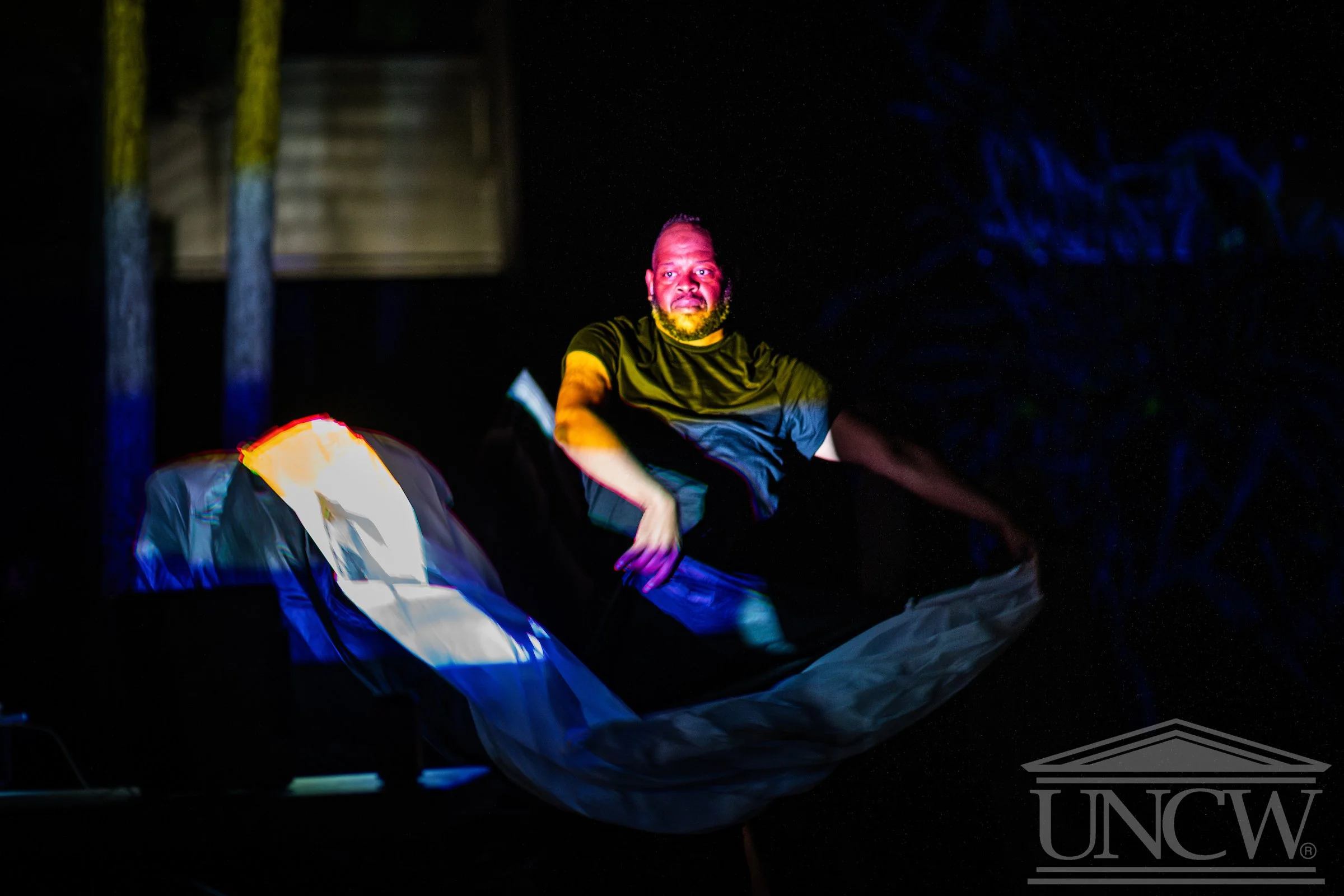 Nonbinaries In Nature (feat. Pan-African Flag), Performance-Drawing, 2024. Photo Courtesy of FlowILM by Bradley Pearce, UNCW, 2024.