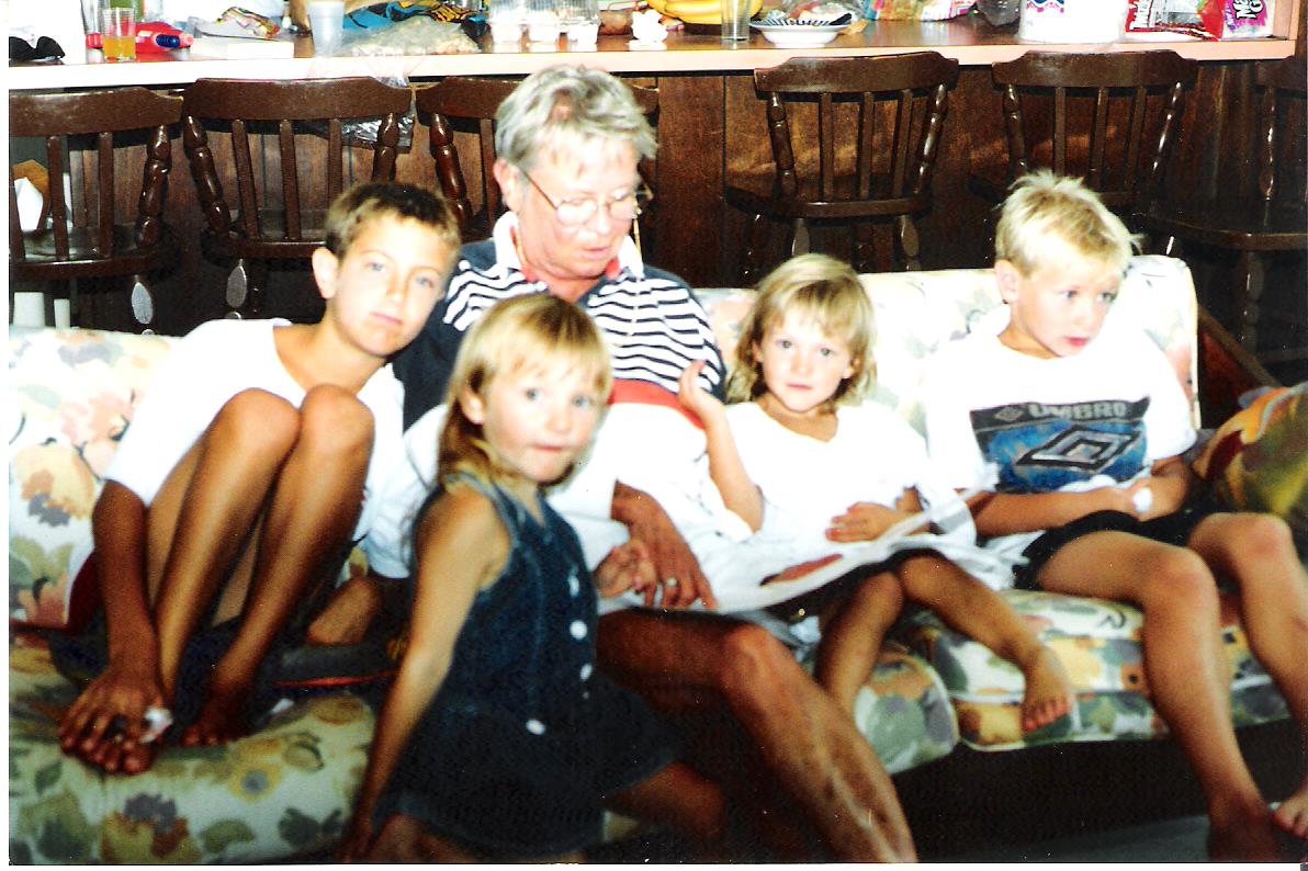 Grandma reading to the kids