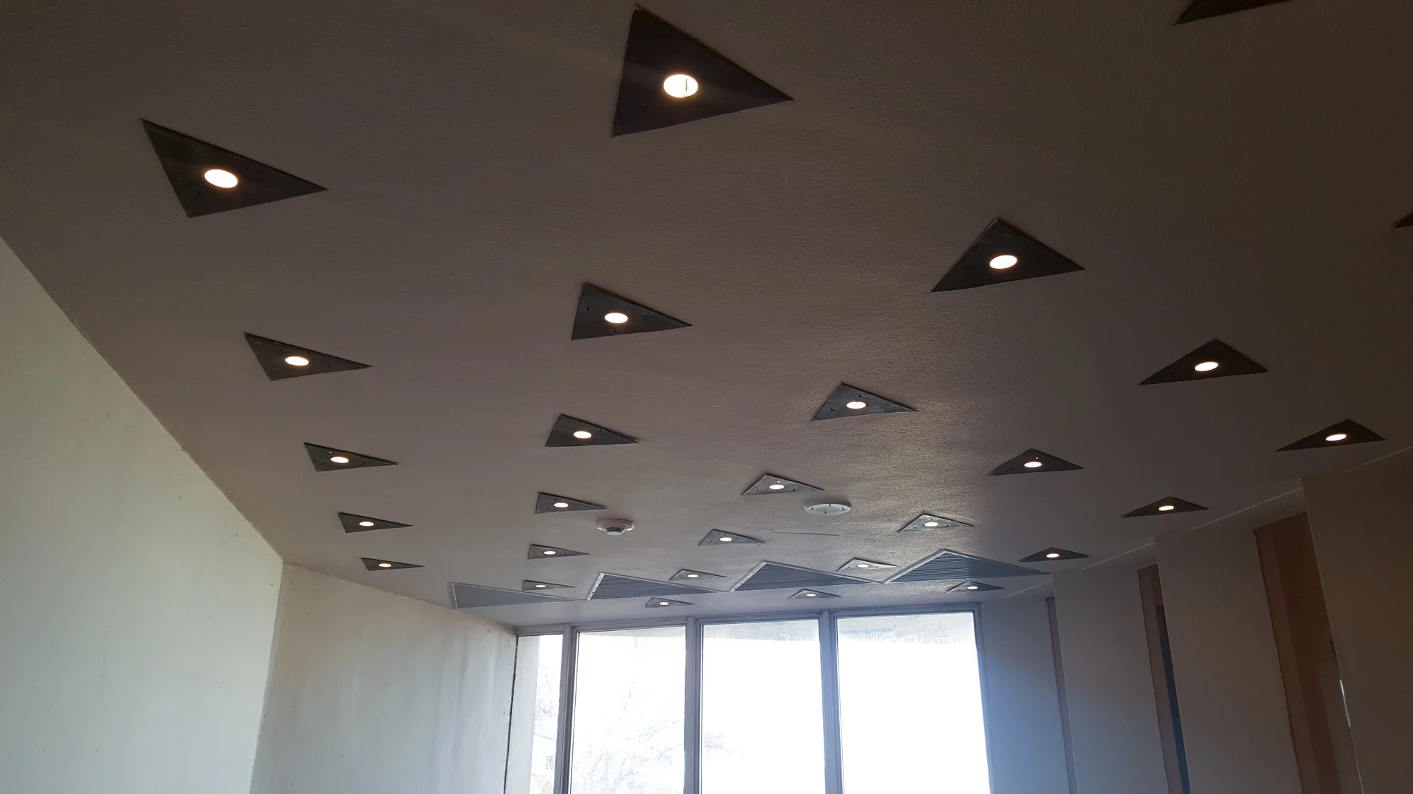 All the lights and air returns in the Price Tower were like these triangles!
