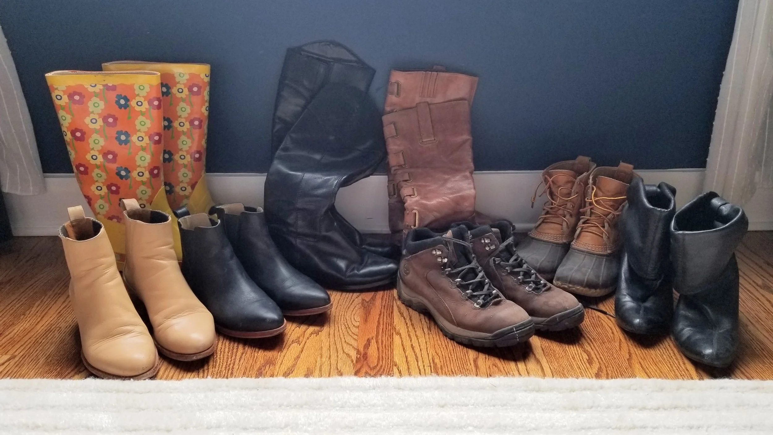 L to R: Veronique Branquinho block heel, rubber rain boots, Nisolo chelsea boots, black riding bootss, brown riding boots, hiking boots, duck boots, dress boots. Not pictured, white pointy ankle boot in the archive.