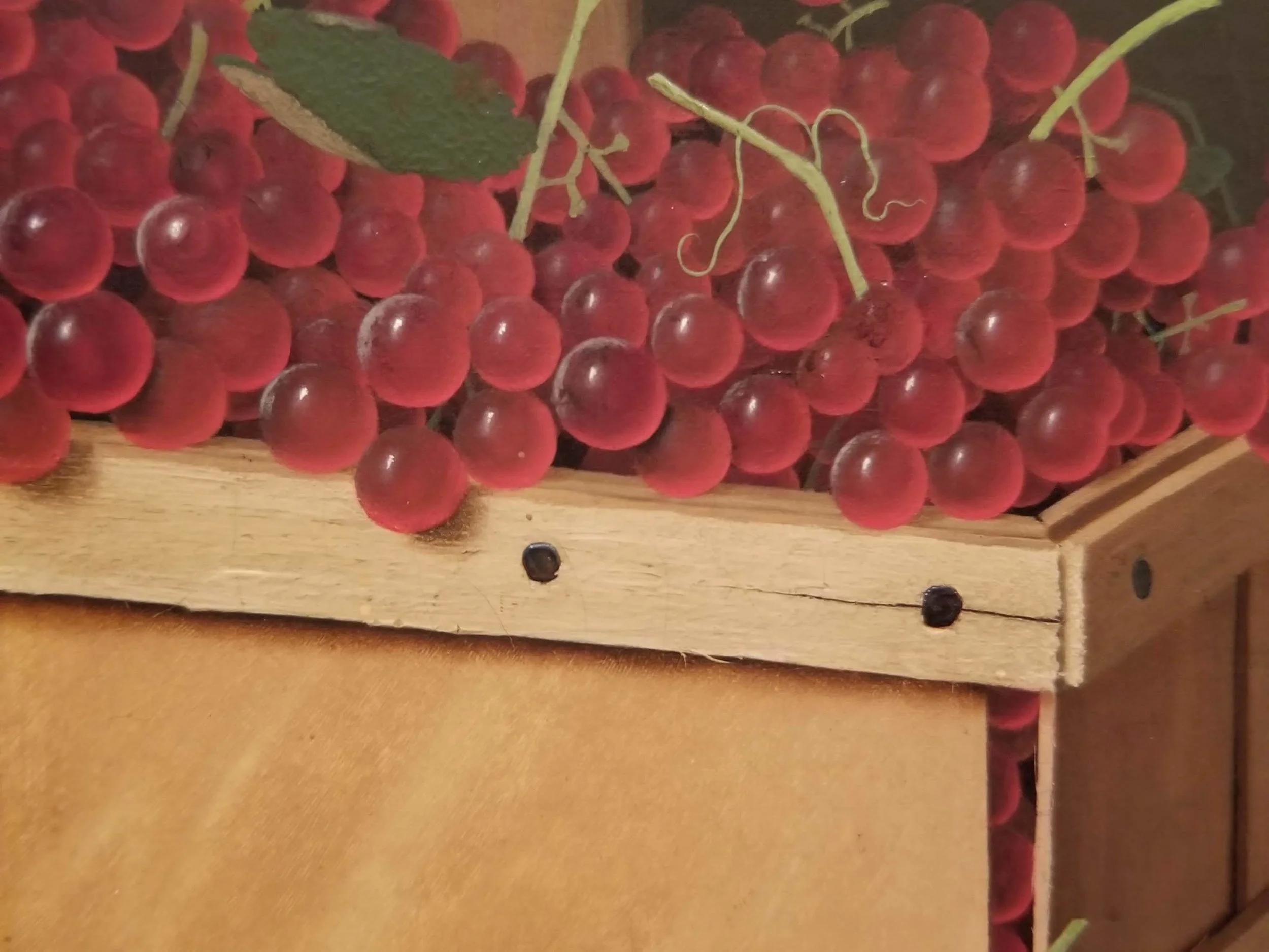 THESE PERFECT GRAPES. THIS LIFELIKE WOOD BOX. That’s a painting!!!