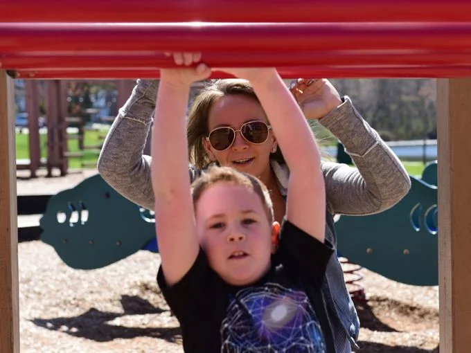Amanda plays on a swingset with her son. Photo: Tariq Zehawi/Northjersey.com