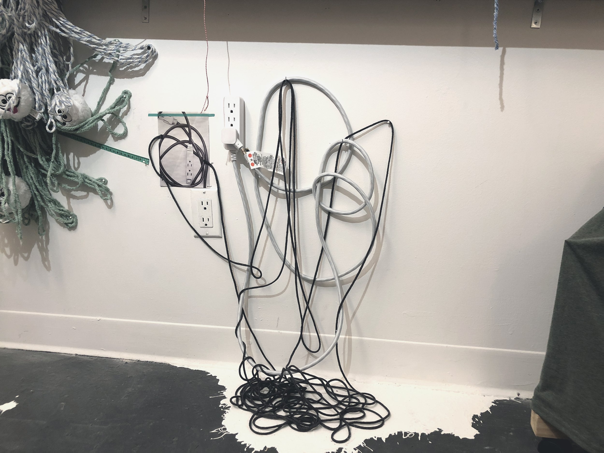 Part of the installation ( "So much like the outlet extension cord which is plugging into itself")