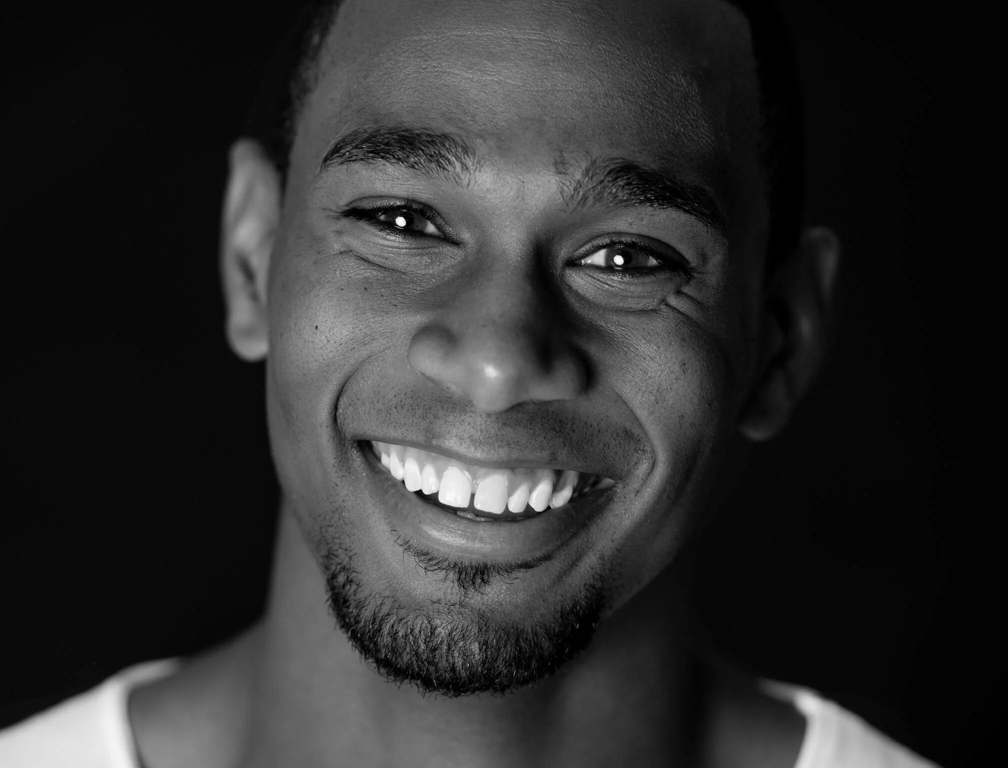 "Big Goofy-Ass Grin. I physically used to be insecure about the gap in teeth. You see in magazines this idea of beauty and you realize ‘Hey, I don’t look like that.’ It’s funny because as I’ve gotten older, that’s one of the things people notice. Pe…