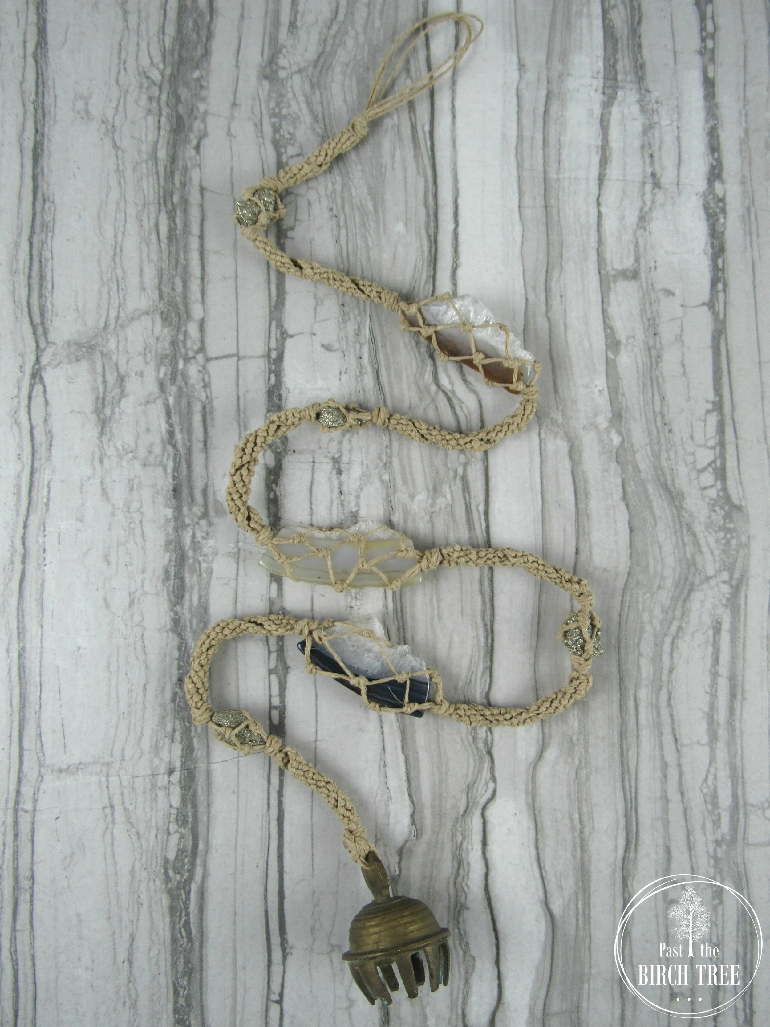 Gemstone Wall Hanging featuring Polished Agate Slices with Raw Pyrite Gemstones and Vintage Brass Claw Bell