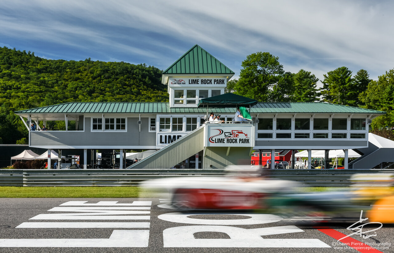  The green flag waves as we cross the start/finish line in front of the iconic Lime Rock Park Pagoda. Fun fact, the Pagoda was designed by a favorite son of LRP Sam Posey. 