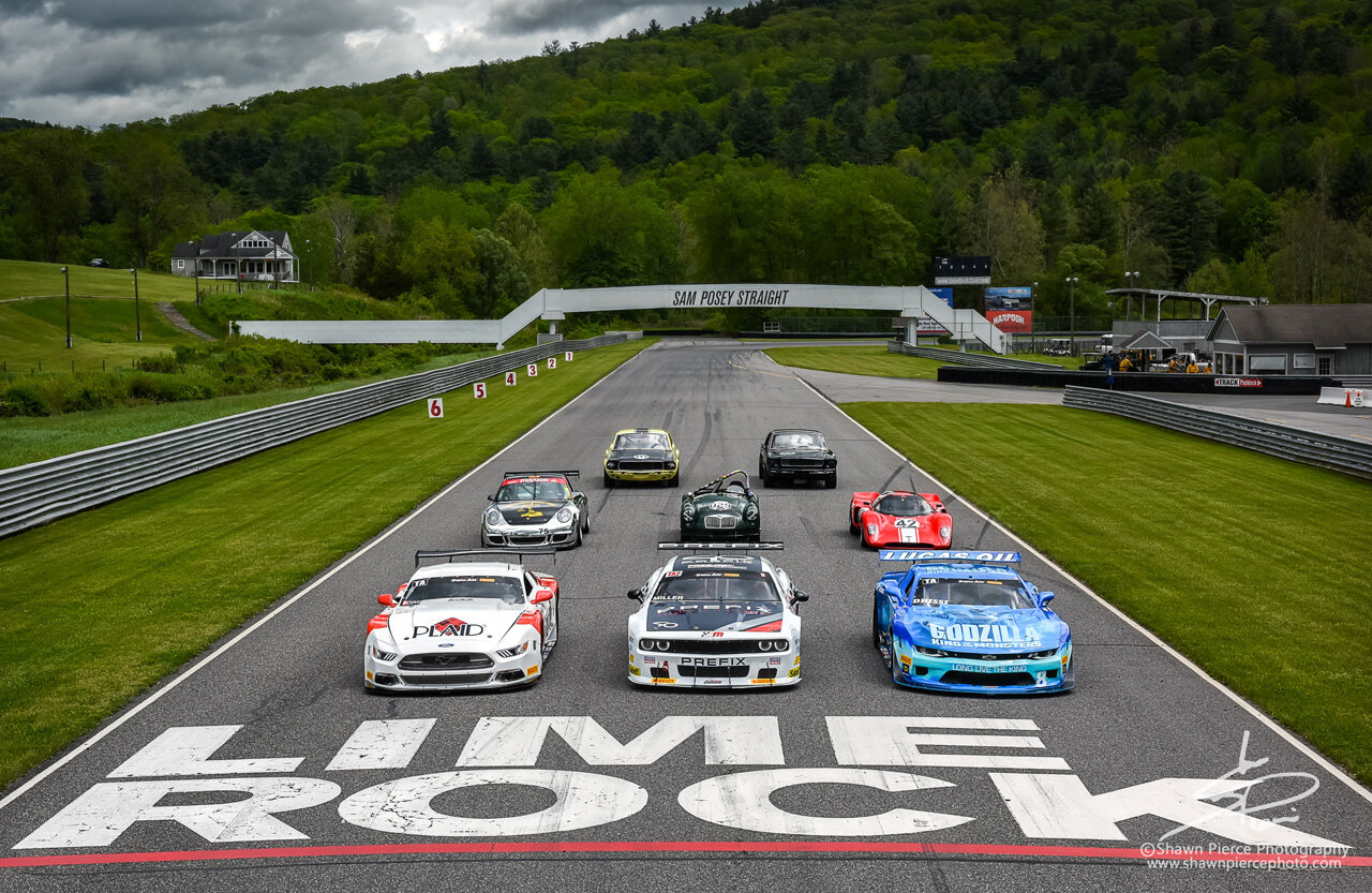  The event display shot featuring cars of The Trans Am Series and SVRA.  