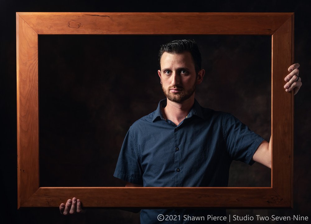  My buddy Jared Plante came in to pose for me and we created these two “business portraits” of him to showcase his picture frame-making business.  