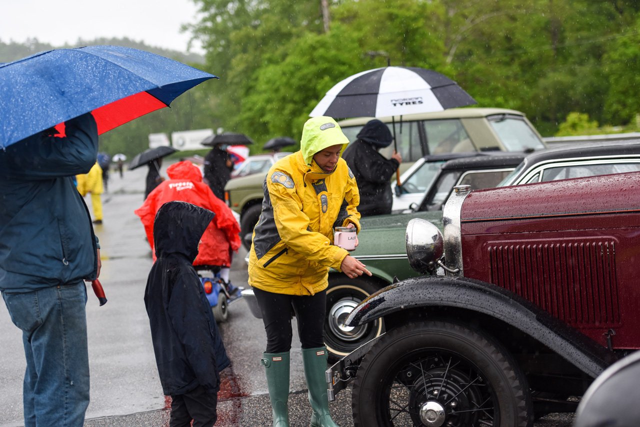  Even the rain won’t keep the Lime Rock faithful away.  