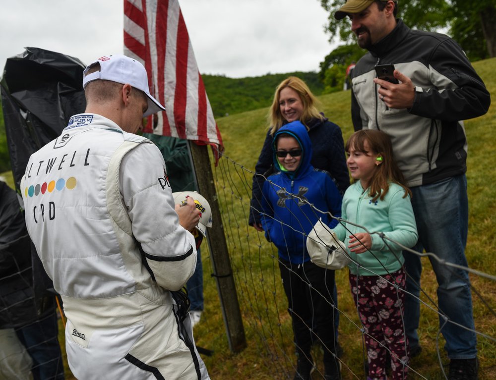  Chris Dyson signing autographs after winning the Trans Am race.  