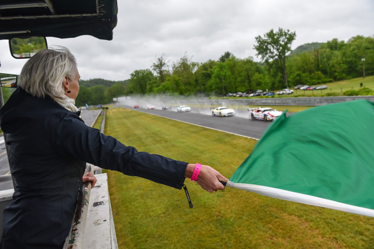  CT State Representative Maria Horn waves the green flag to start the Trans Am TA/SGT race Memorial Day weekend.  