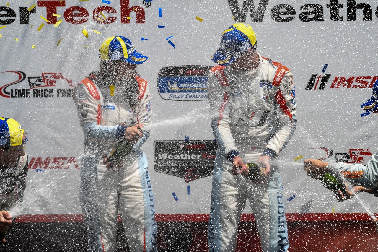  And both of them spraying the champagne in Victory Circle.  