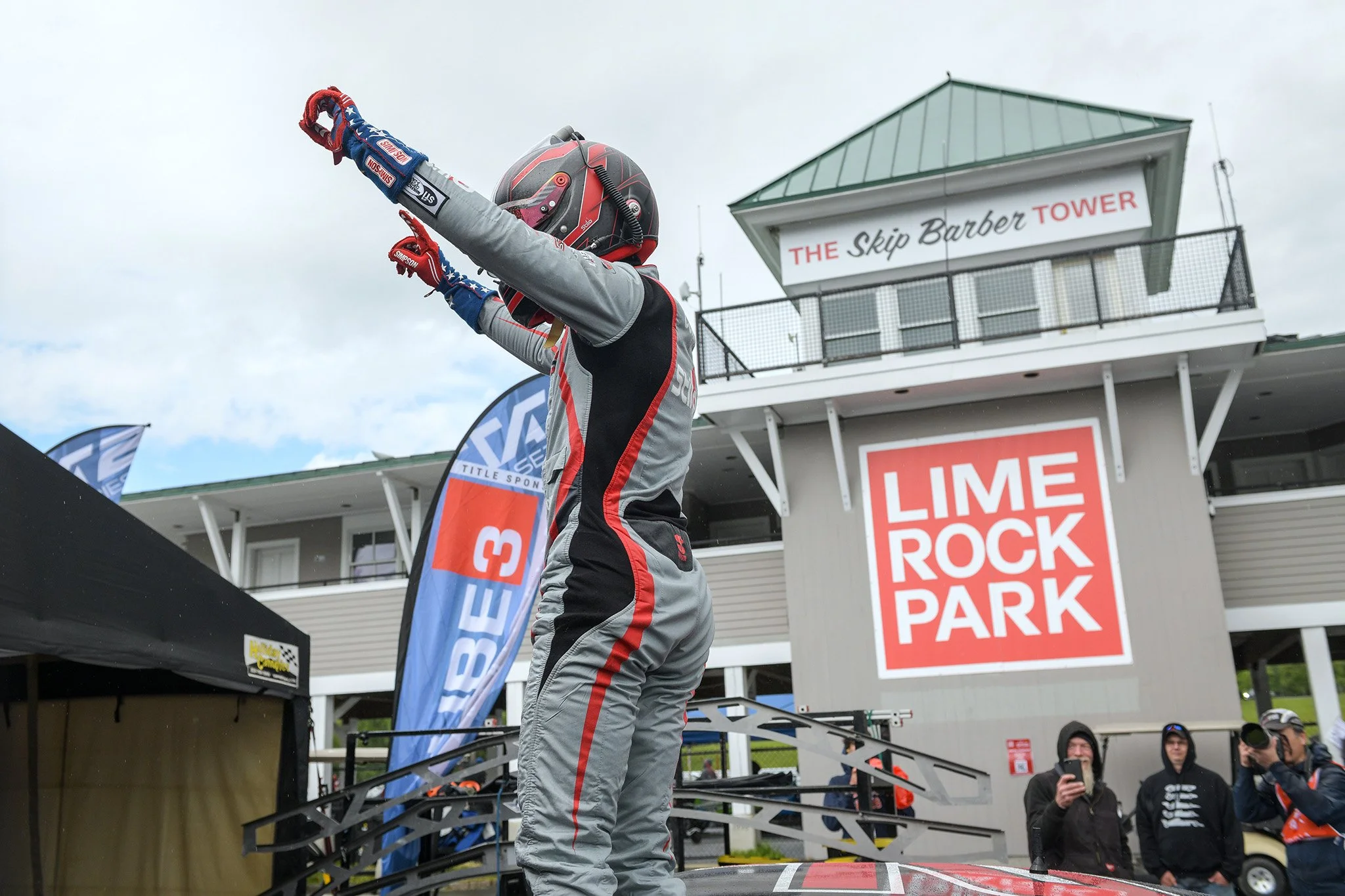  TA2 race winner Sam Corry after climbing out of the the #70 Toyota Camry.  