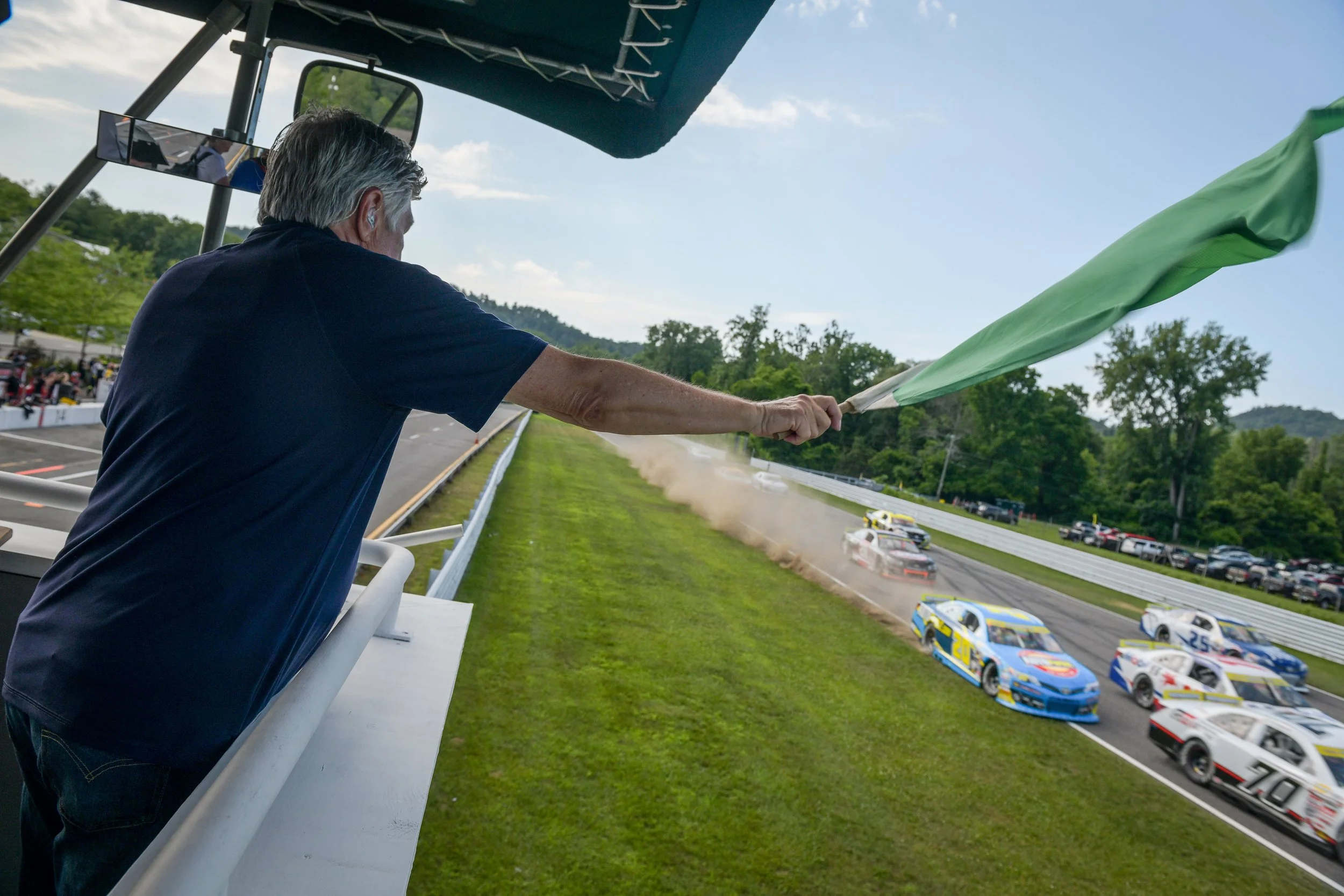  The voice of NASCAR Mike Joy waving the green flag for the the ARCA Menards Series race that closed out the weekend.  
