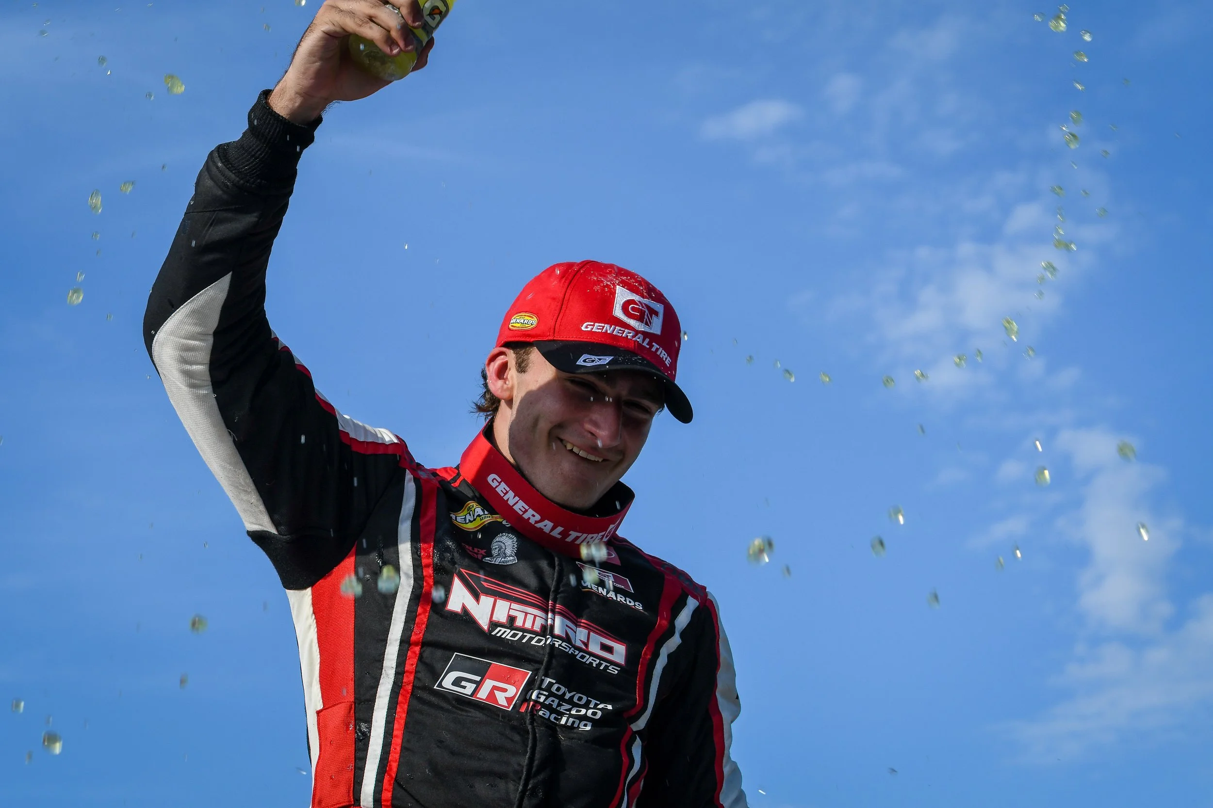  Thomas Annunziata celebrates on the roof of his car after winning the Lime Rock ARCA 100 
