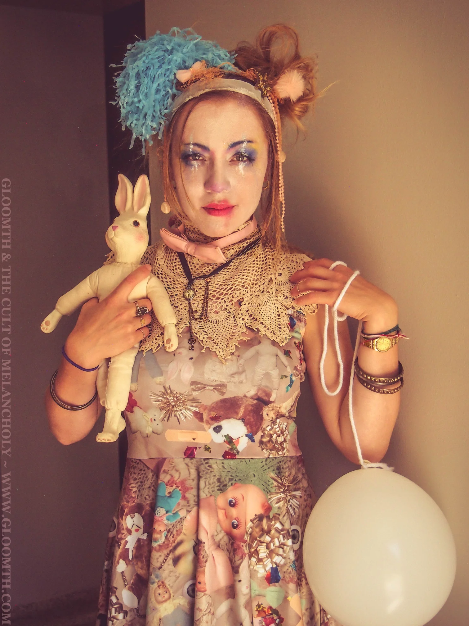 clown girl makeup with vintage toy print dress