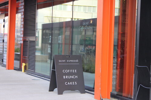 Coffee, brunch sign outside of Here East Saint Espresso Cafe