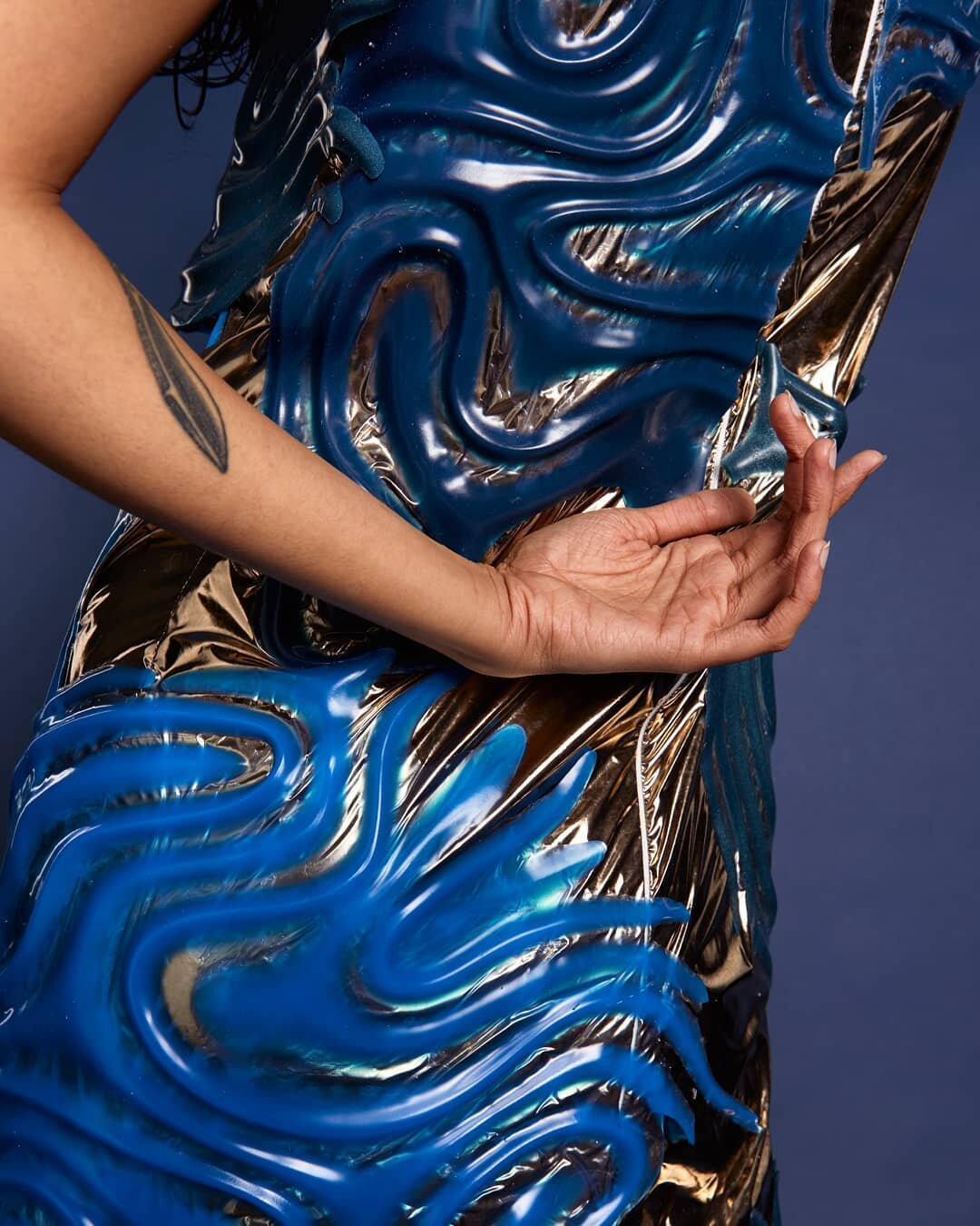 The Sea Dress Detail shot. Molded silicone adhered to metallic film fabric to create a drenched, wet look

photo: @tylerjudson 
model: @tiafafloof
makeup: @maayaneli9 
hair: @tightsaf 
assistant: @katherinediazvillegas 
#fashiondesign #textiledesign 