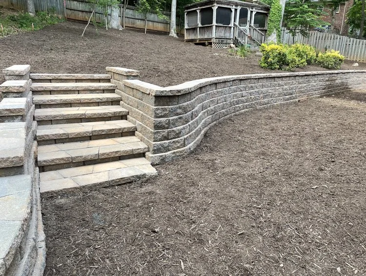 Engineer spec built retaining wall and steps 