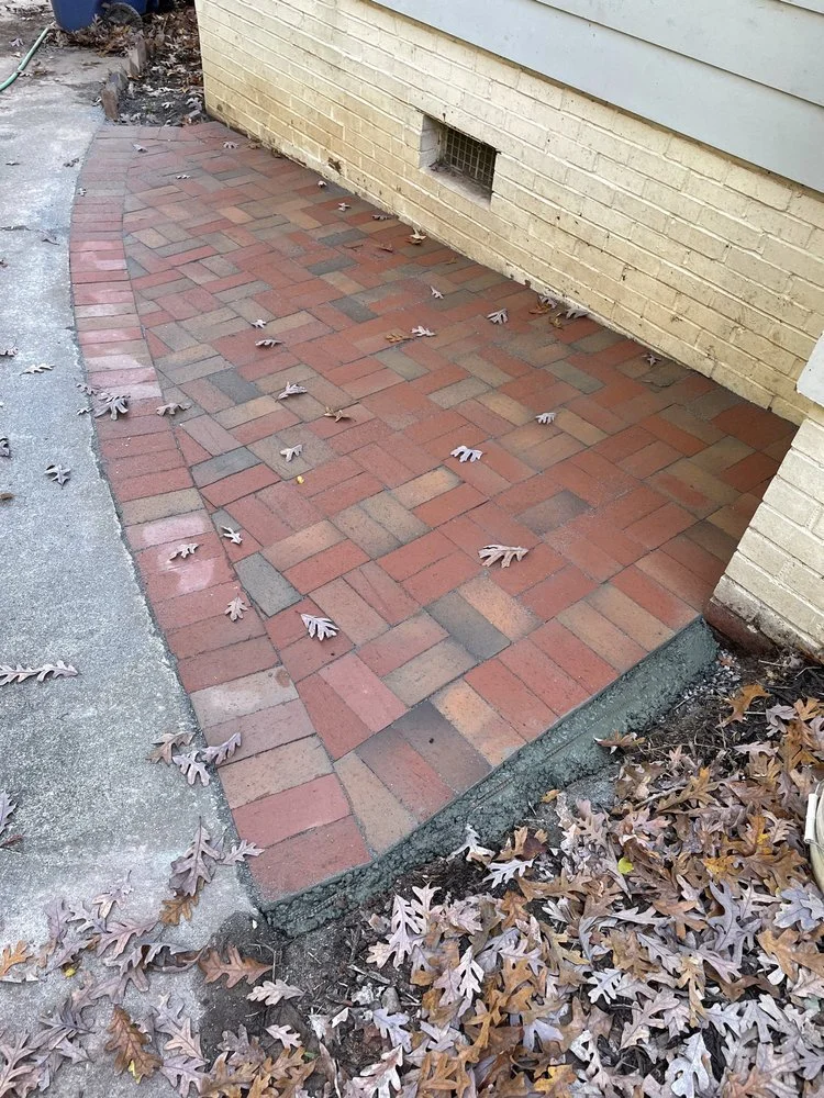 Tight fitting brick pavers to control erosion
