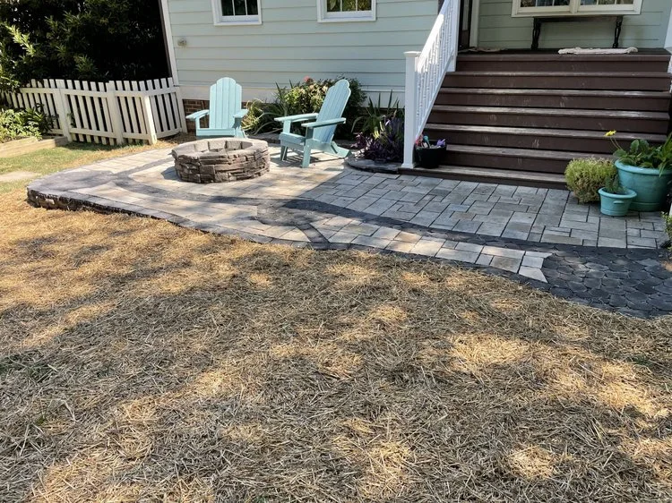 Custom patio and fire-pit with stone inlay