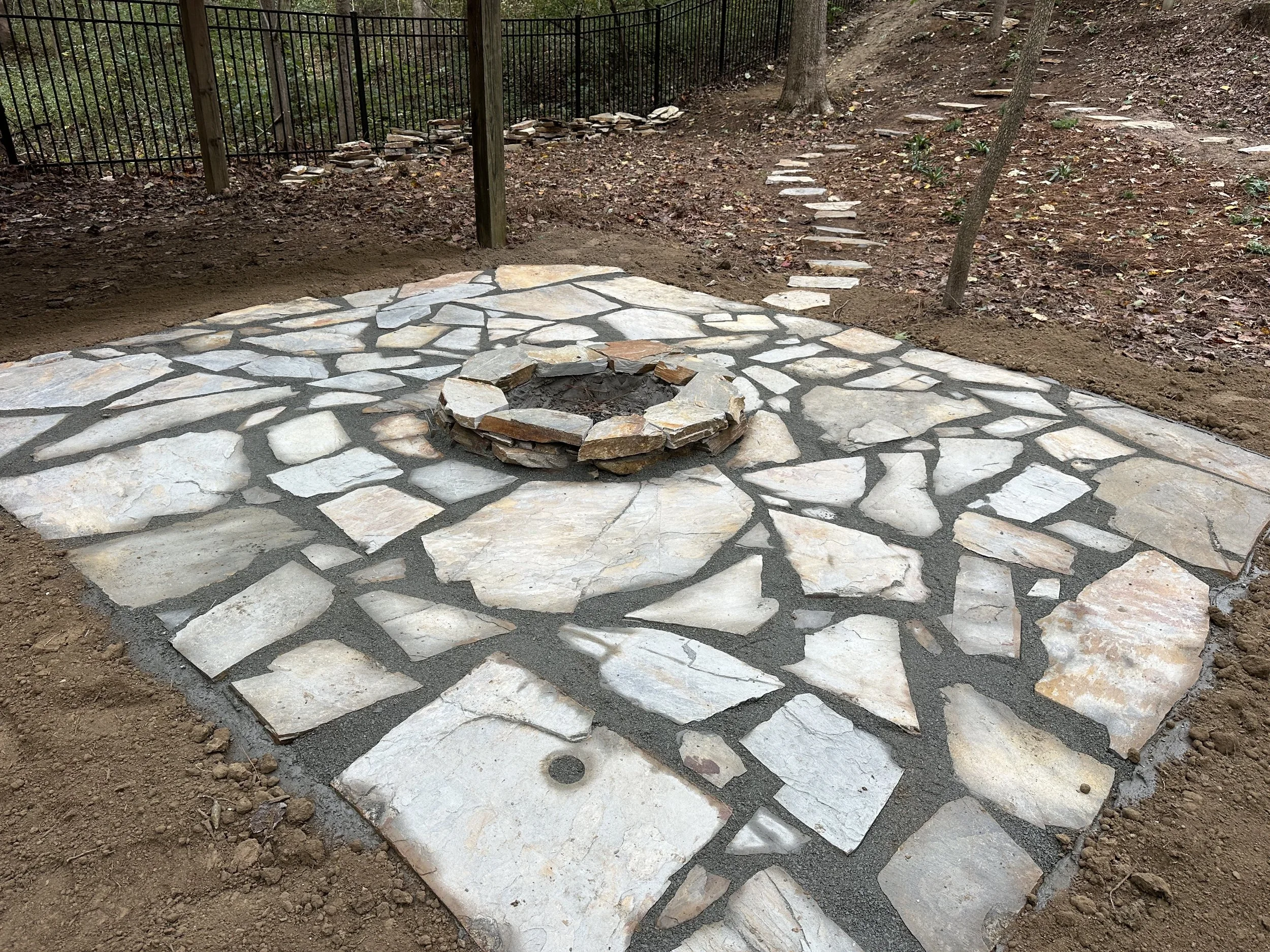 Large flagstone pad with fire pit