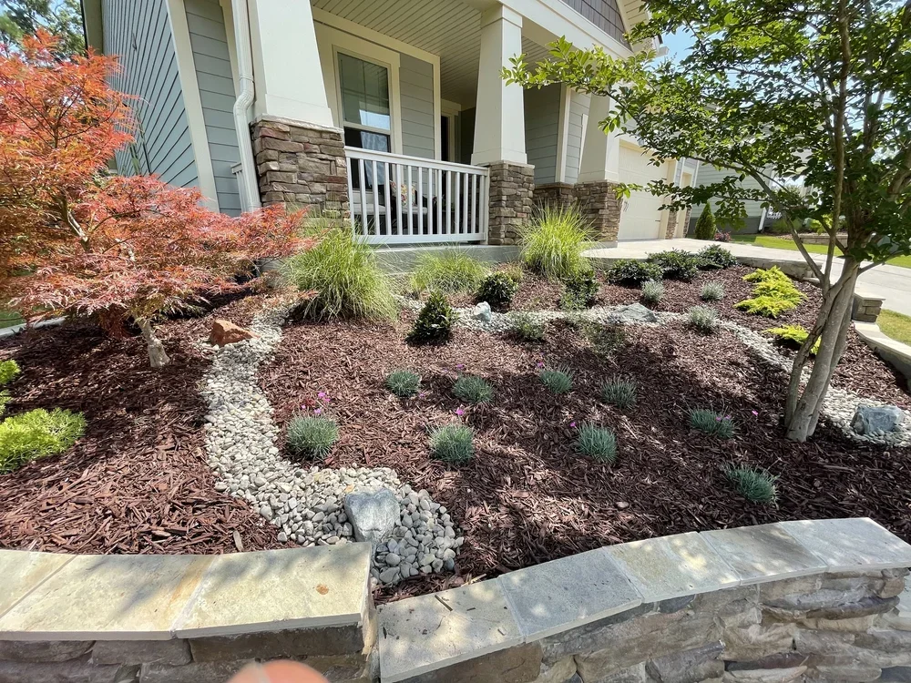 Native landscape with downspout water managment