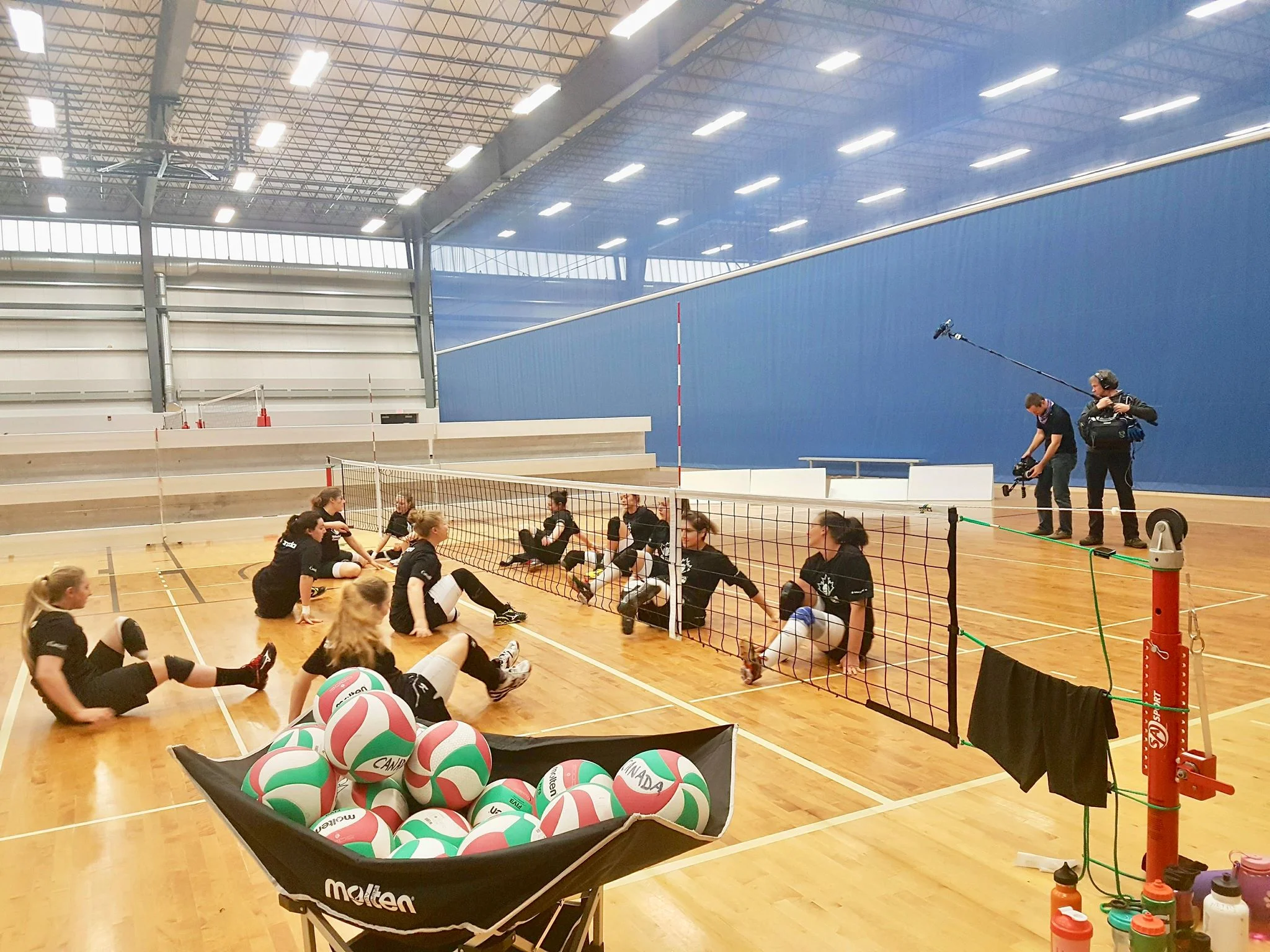 Jenn Oakes and Team Canada Sitting Volleyball Team filming with Thomas Dudley Productions for HERoic Documentary