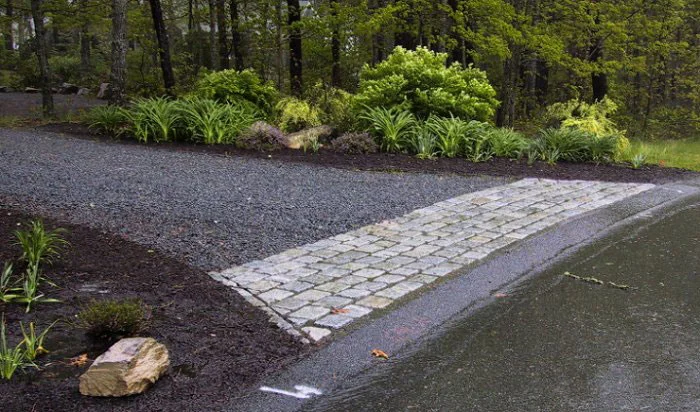  This is a proper apron for a gravel driveway.
