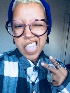 DZL MC is a queer Afro-Boricua artist, writer, bruja, and melodic kitten hailing from Western Massachusetts, now residing in Baltimore. She is co-founder of blkottonkandy, an initiative for keeping healing of the mind, body, and spirit accessible to all through artistic expression. She is formerly of Eat The Cake Band, having since struck out on her own to craft her sound and essence. Throughout her life, she has gained much wisdom and emotional intelligence via relationships with others, which have all become inspiration for her spiritual journey. Find her on Instagram at @idreamofdzl.