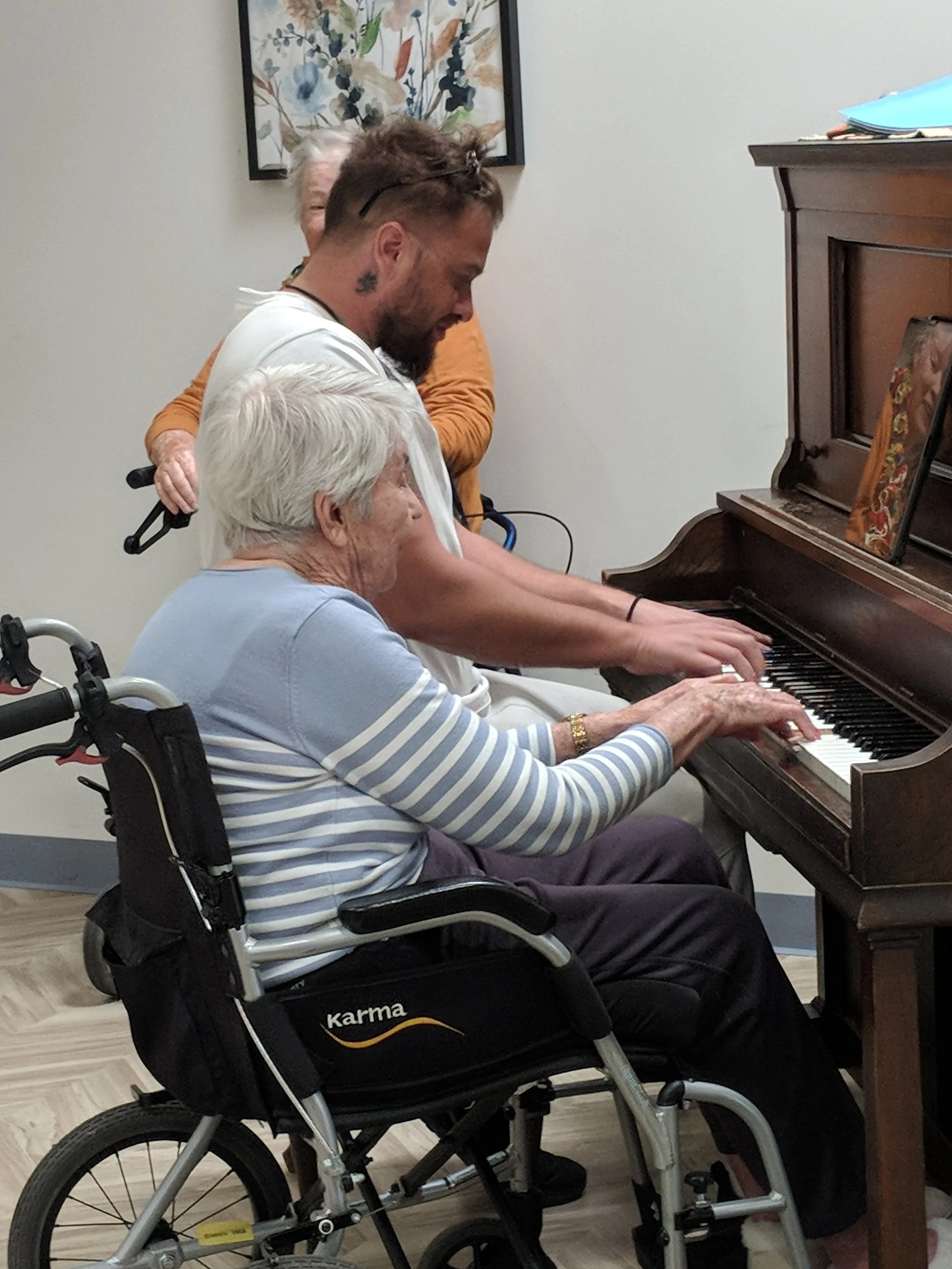 Jeremy entertains with the piano at Loreto