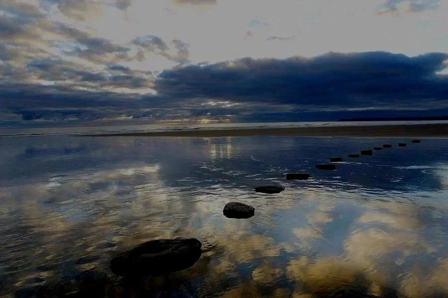 stepping-stones-over-water-with-sky-peter-cade.jpg
