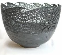 Bob Emmet 'I studied at Ipswich School of Art and Lowestoft College of Further Education in the 1970s, then worked as a freelance ceramics designer for various potteries in Hampshire during the 1980s. I was an Art and Design technician and part time lecturer at Portsmouth School of Art during the 1990s. I have always had a fascination of the sea, its moods and movement, so I try very hard to get a sense of movement in my work. Long term influences have included Arabic writing, Celtic knot-work designs and that all time staple Art Nouveau I mostly work in stoneware but am wrestling with porcelain - the translucent quality gives so many more possibilities . Glazes are matt or satin, occasionally using coloured porcelain slips and lustres.’