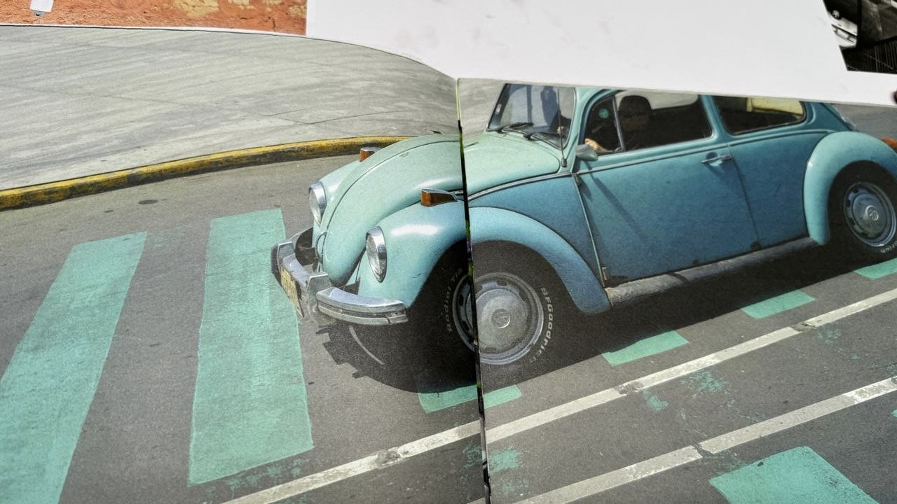 Image of a teal blue Volkswagen Beetle, or Vocho, printed on final paper for the book Vochos Unidos by Rodrigo Gaya Villar, published by Carrara Media (2026). The paper is matte and uncoated, and is 100-percent sourced in Mexico.