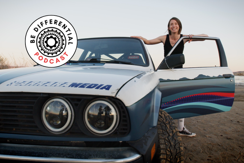Kelly Conroy, author of 'Your Mom Races Rally' published by Carrara Media, poses with her BMW E30 rally car after appearing on the Be Differential Podcast with Eva Gregory.