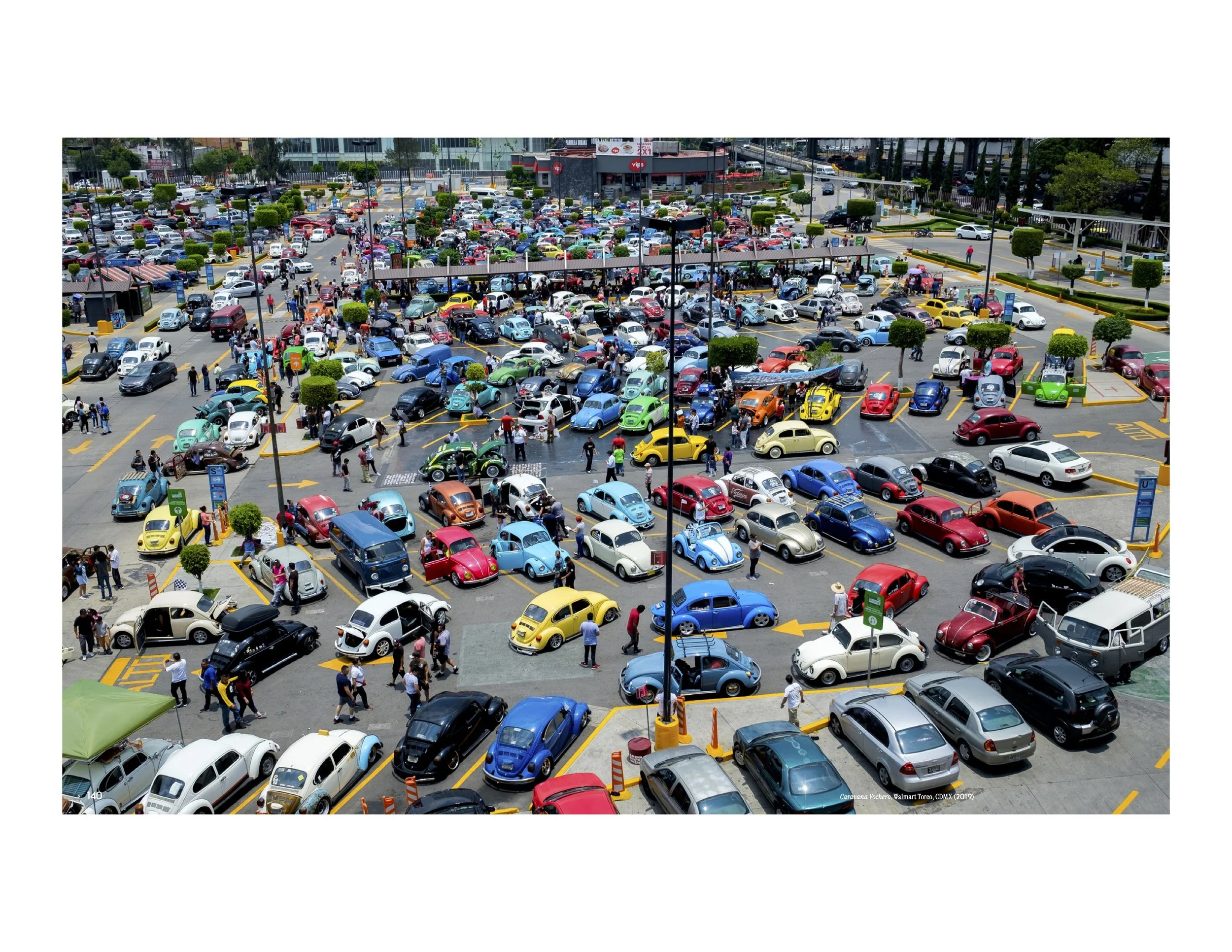 An overhead view from the annual festival Xochivolks, celebrating the "Vocho" or Volkswagen Beetle, in Mexico City from the coffee table book Vochos Unidos by photographer Rodrigo Gaya Villar. Published by Carrara Media, 2026.