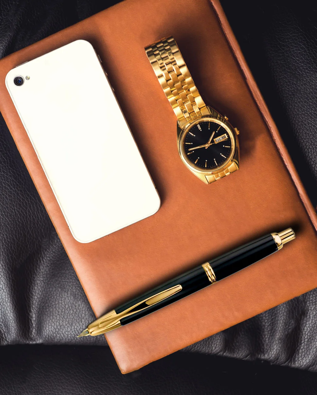 Capless Gold Flat Lay Gold and Brown book.jpg