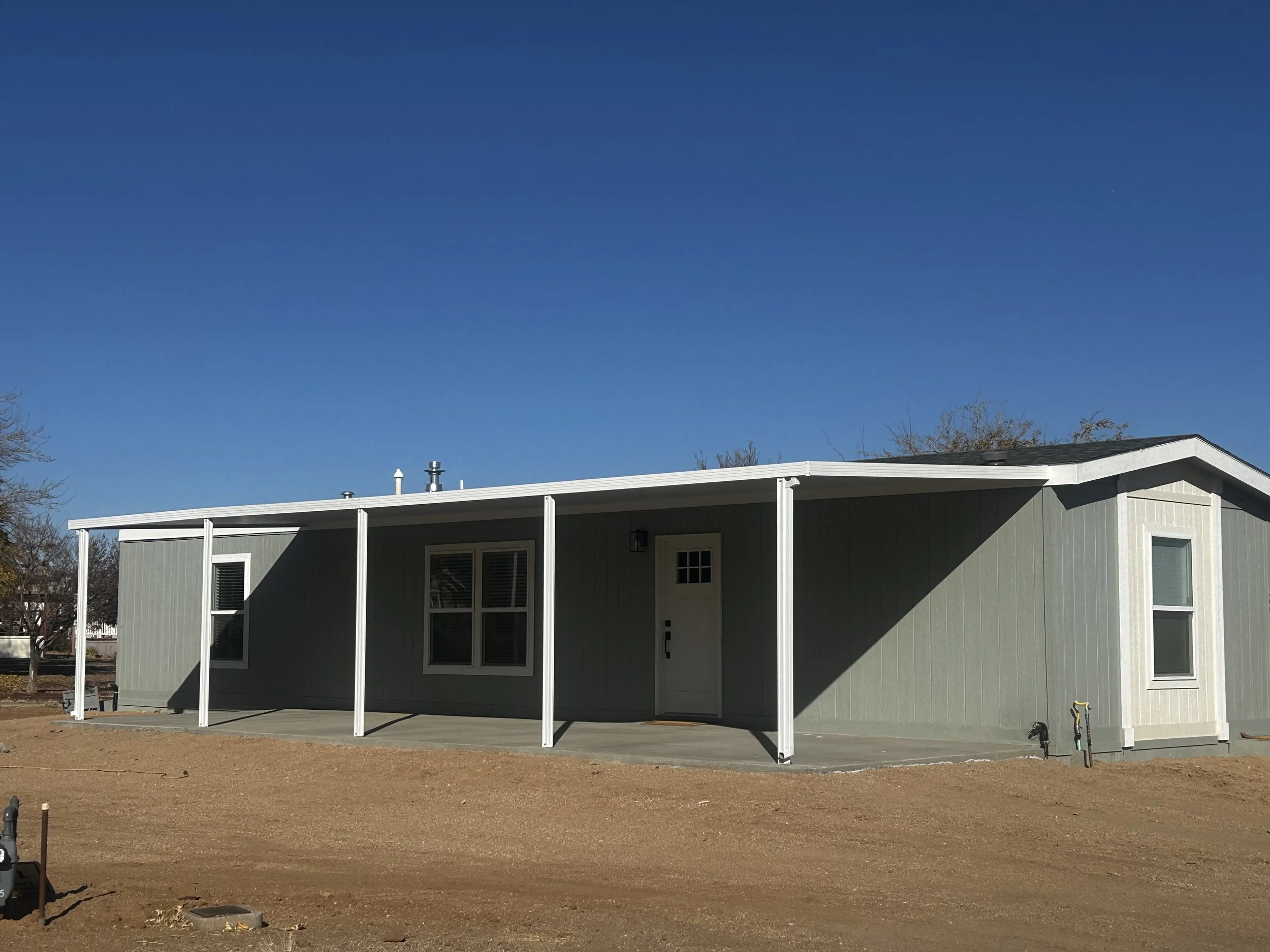 Contreras Home with awning.jpg