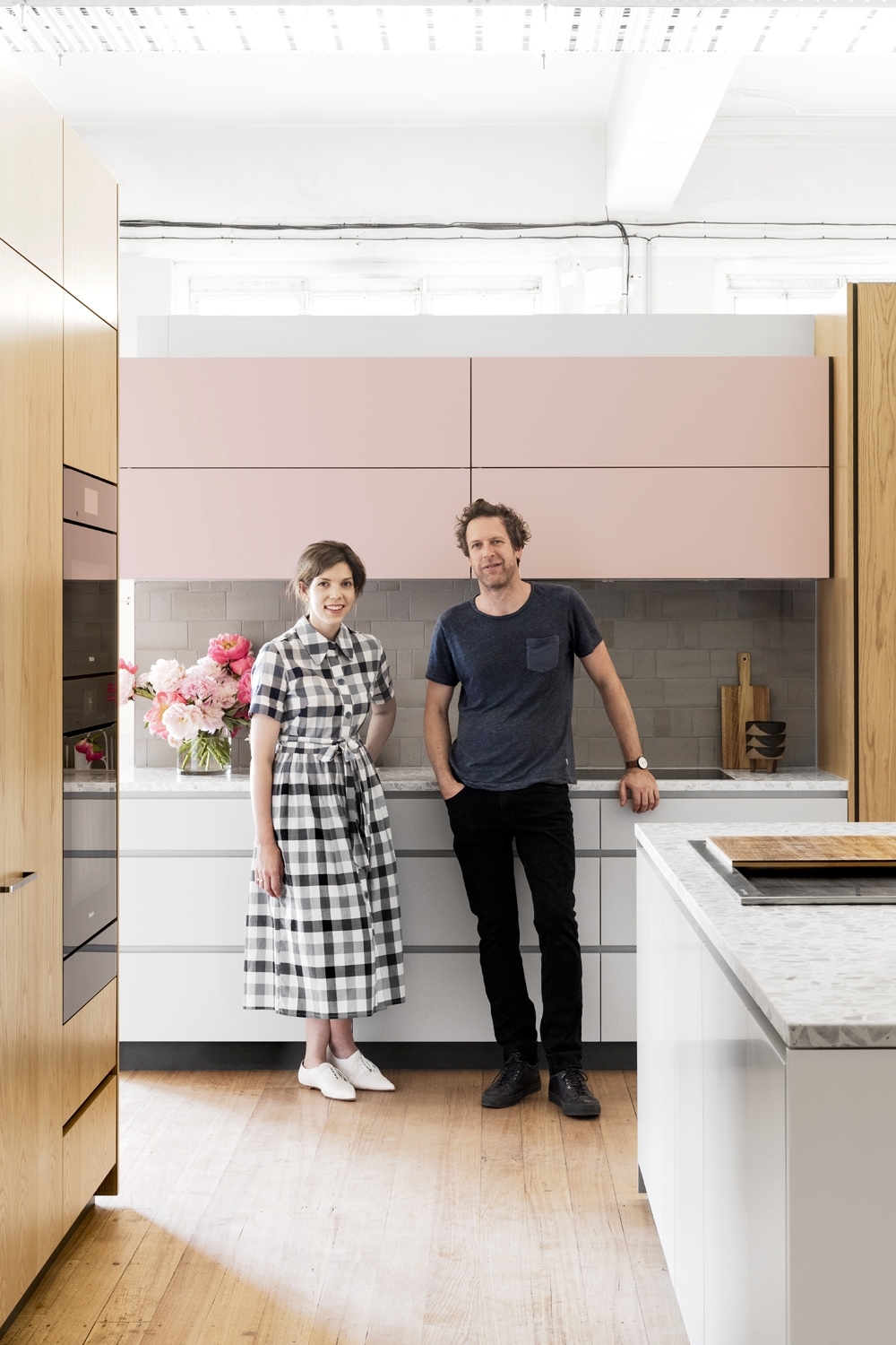 Lucy and Travis with the DFOH Cantilever Kitchen