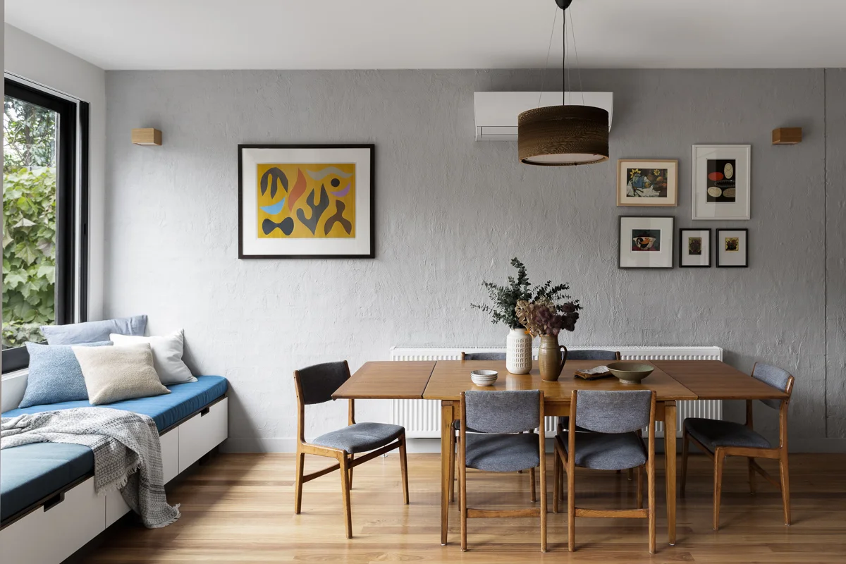 The John Coburn print (left) is a family favourite and influenced the colour scheme for the house.