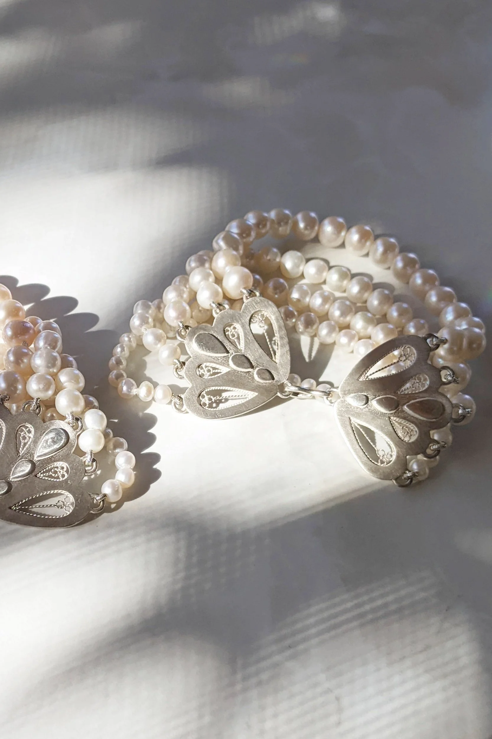 White Pearl Mulit-Strand Bracelets
