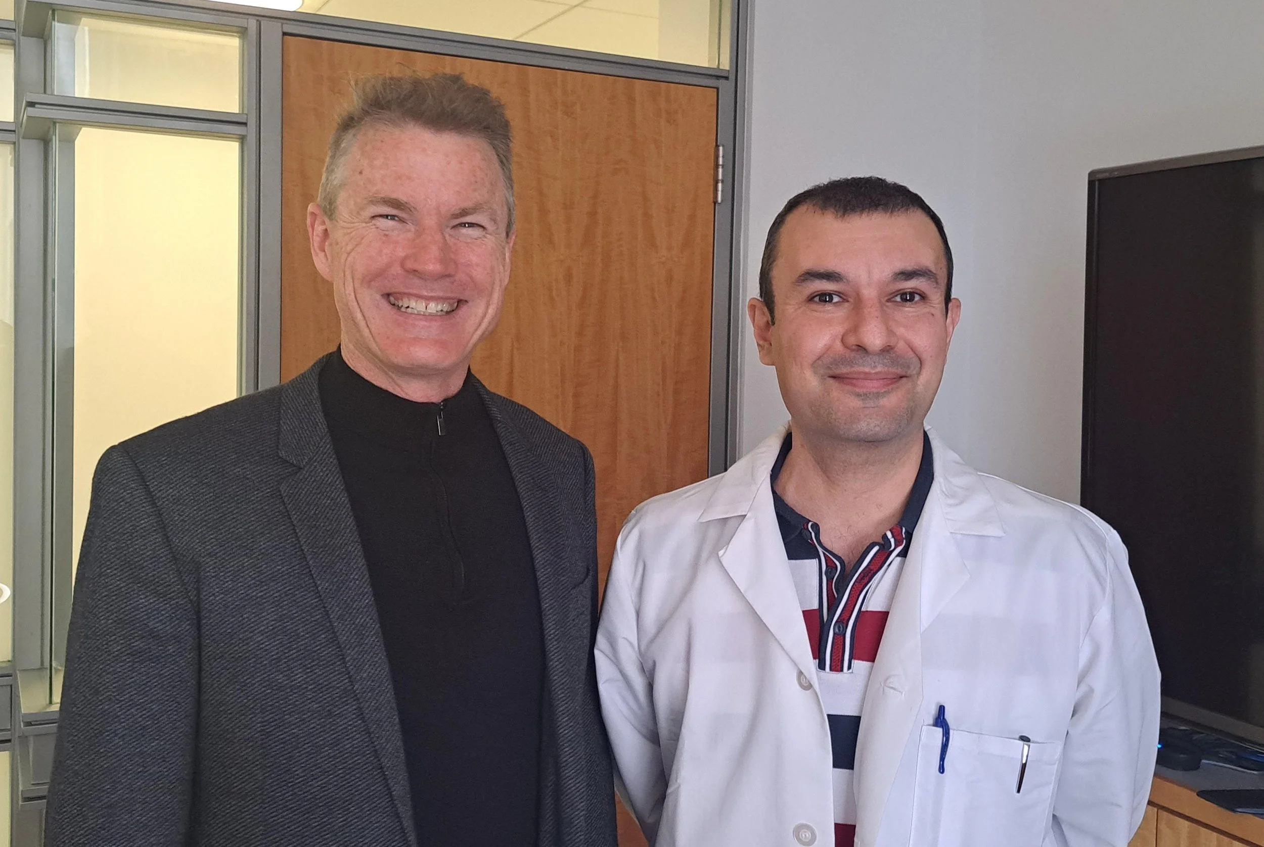 Bruce McCabe and Aykut Demirkol at the Harness Eye Institute