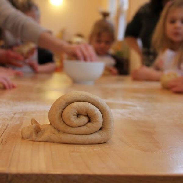 Each week our shooting stars make bread buns (and snails) for their morning snack. Here&rsquo;s a throwback from last year. First they pat it, then they roll it, and mark it with a B. 
 
#nurseryclass #waldorfnursery #breadmaking #paddycake #rhinebec